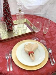 gold and red dinner place setting