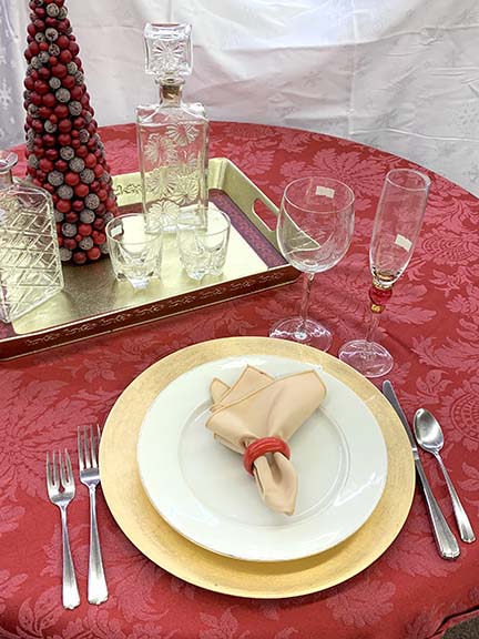 red and gold dinner place setting