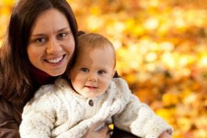 mother and baby in autumn