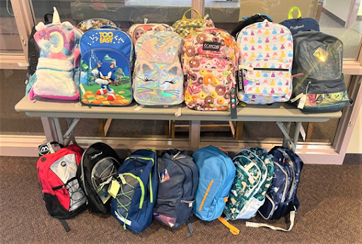 Backpacks from Commit to Kids Day
